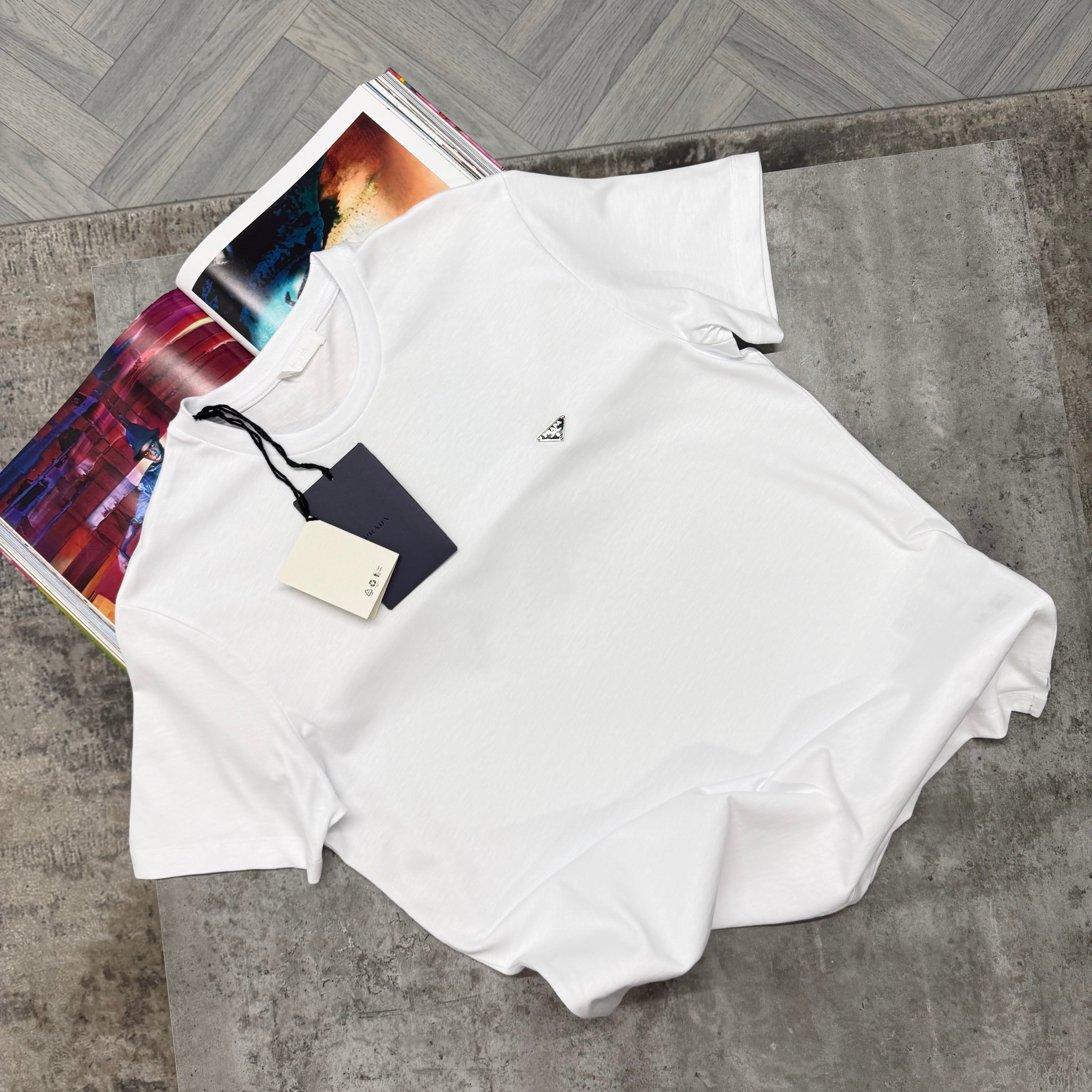 PDA SMALL SILVER BADGE T SHIRT - WHITE